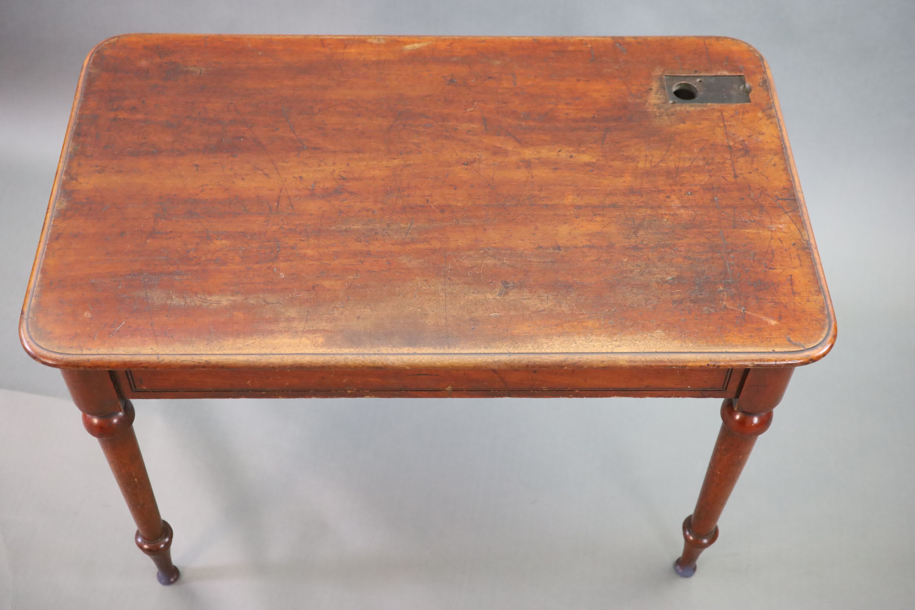 A Victorian mahogany writing table, W.114cm, D.69cm H.76cm